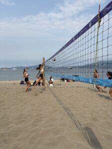 Girls playing beach volleyball